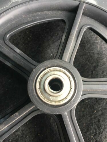 DRIVE MEDICAL Non powered wheelchair Front wheel and bearings with axle from a Drive Cirrus Wheelchair